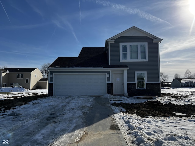 view of front of property with a garage