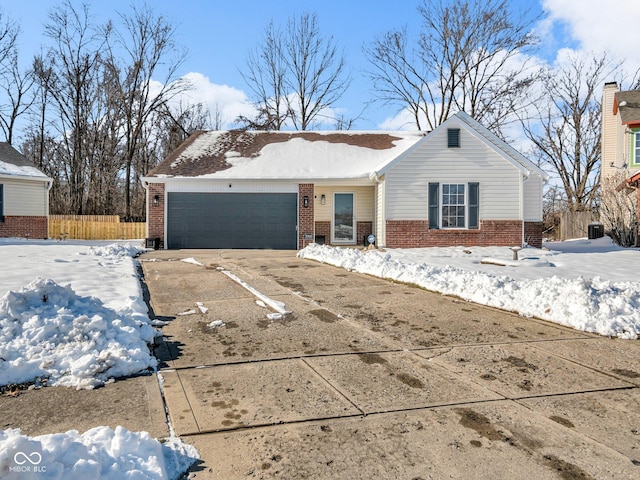 single story home with a garage