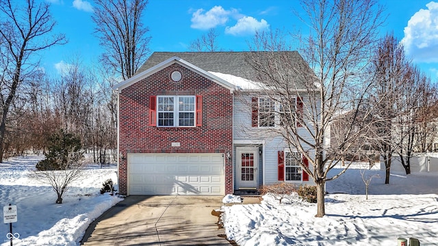 front of property with a garage