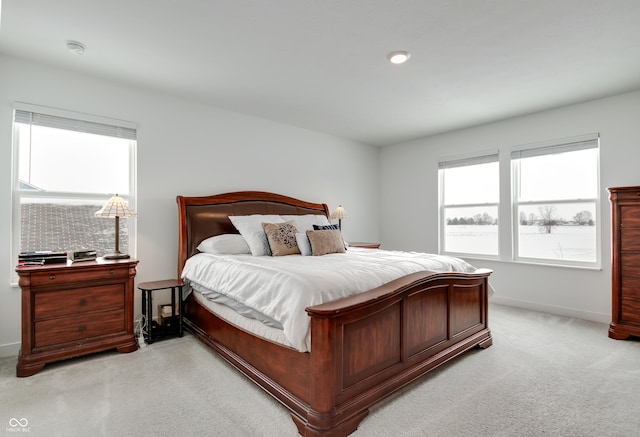 bedroom with light carpet