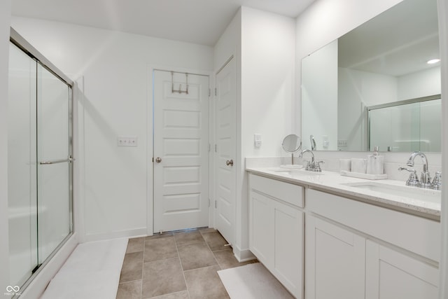 bathroom featuring vanity and walk in shower