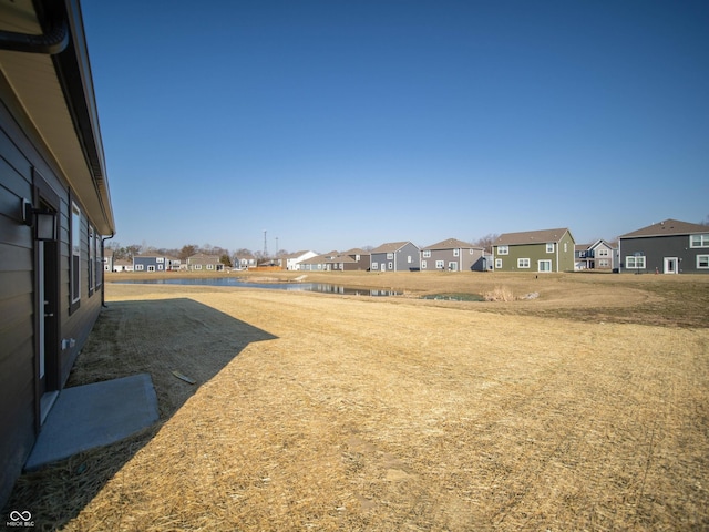 view of yard with a residential view