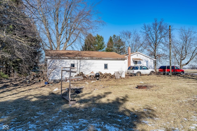 view of home's exterior featuring a yard