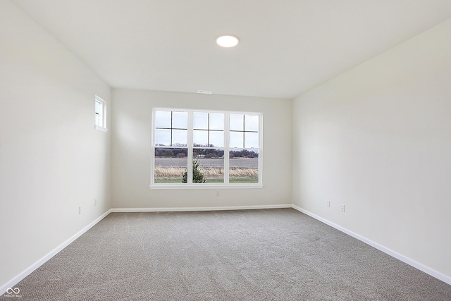 unfurnished room featuring carpet floors