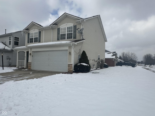 view of front of property with a garage