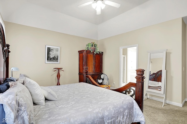 bedroom with lofted ceiling, light colored carpet, and ceiling fan