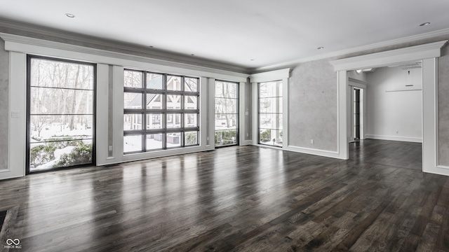 unfurnished room featuring dark hardwood / wood-style floors and crown molding