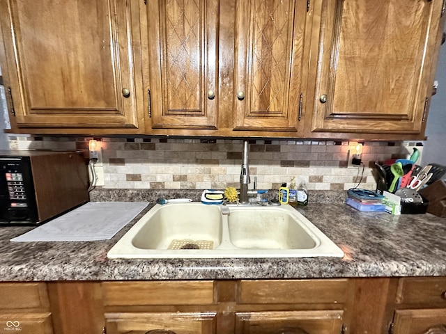 kitchen with tasteful backsplash and sink