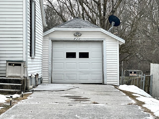 view of snow covered garage