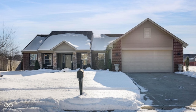 view of front of property with a garage