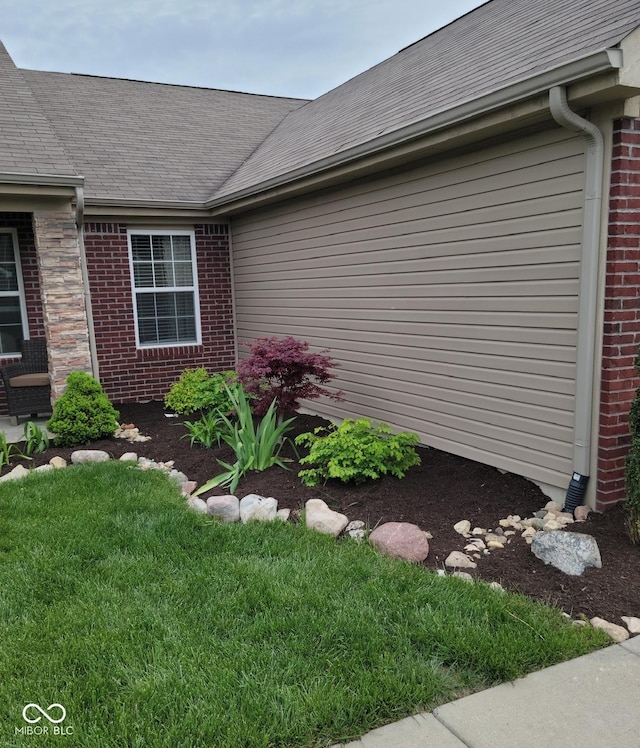 view of home's exterior featuring a lawn