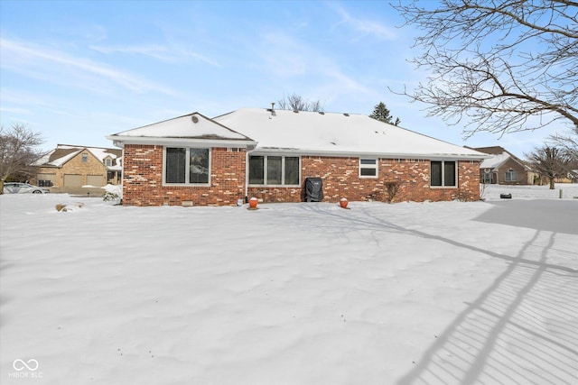 view of snow covered property