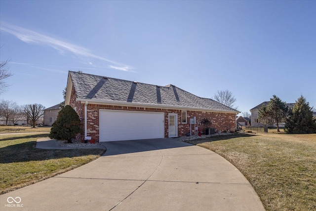 single story home with a garage, central AC, and a front yard