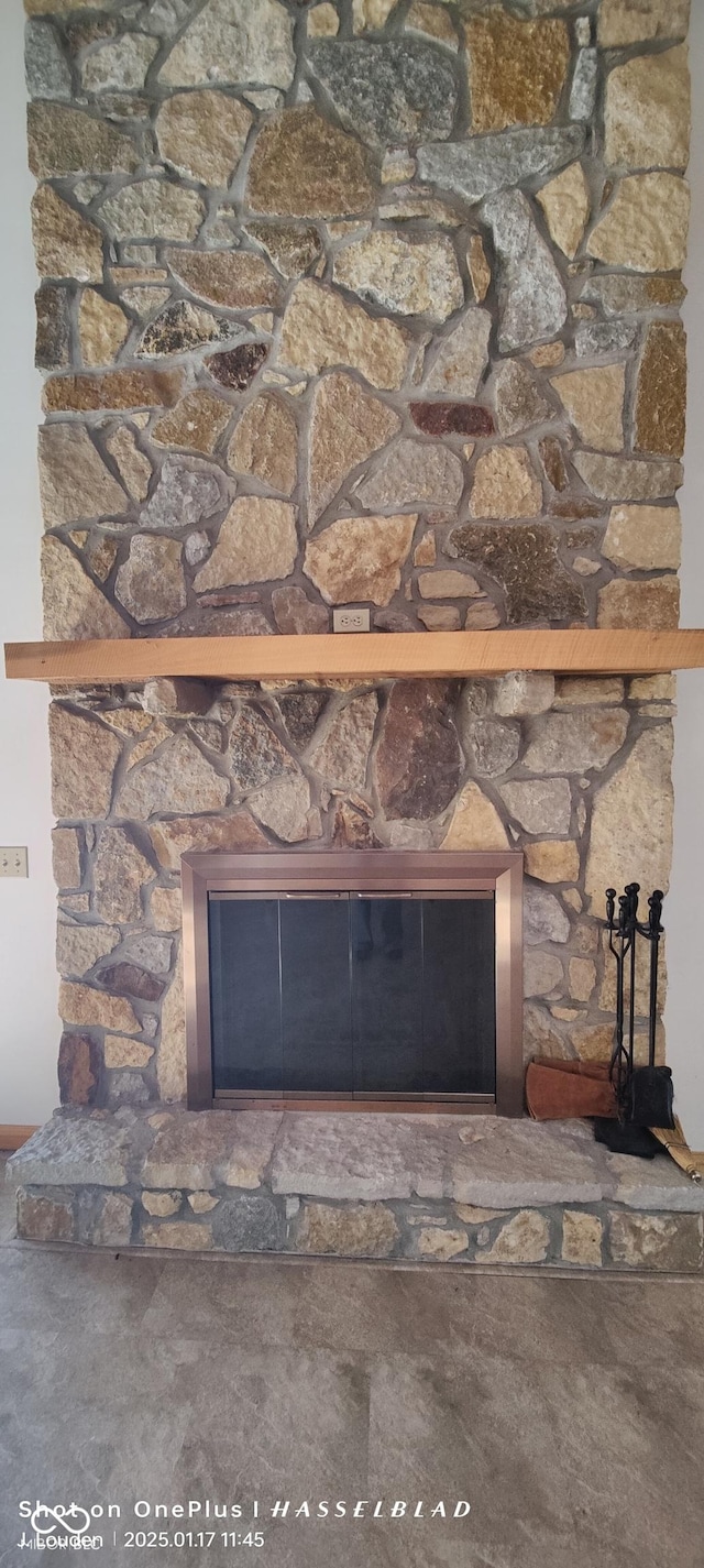 room details with a stone fireplace