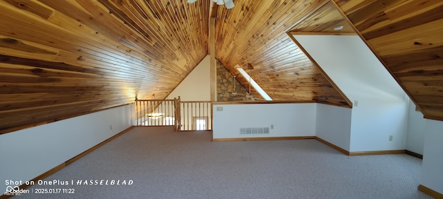 bonus room with ceiling fan, lofted ceiling, carpet floors, and wooden ceiling