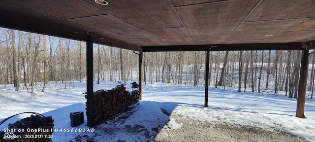 view of yard layered in snow