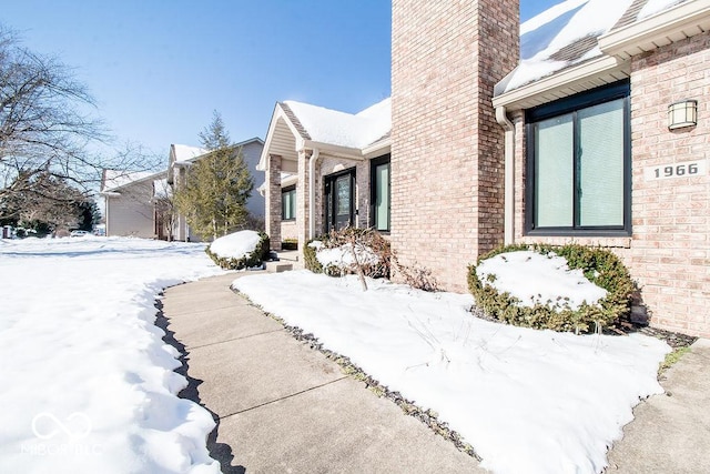 view of snow covered property