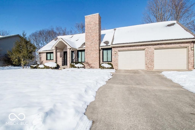 view of front of home with a garage