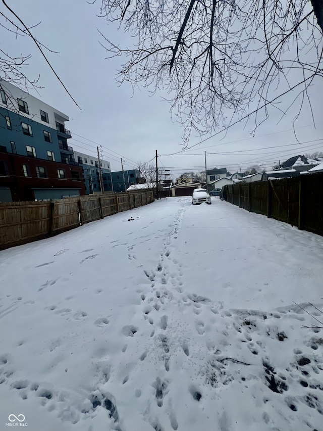 view of snowy yard