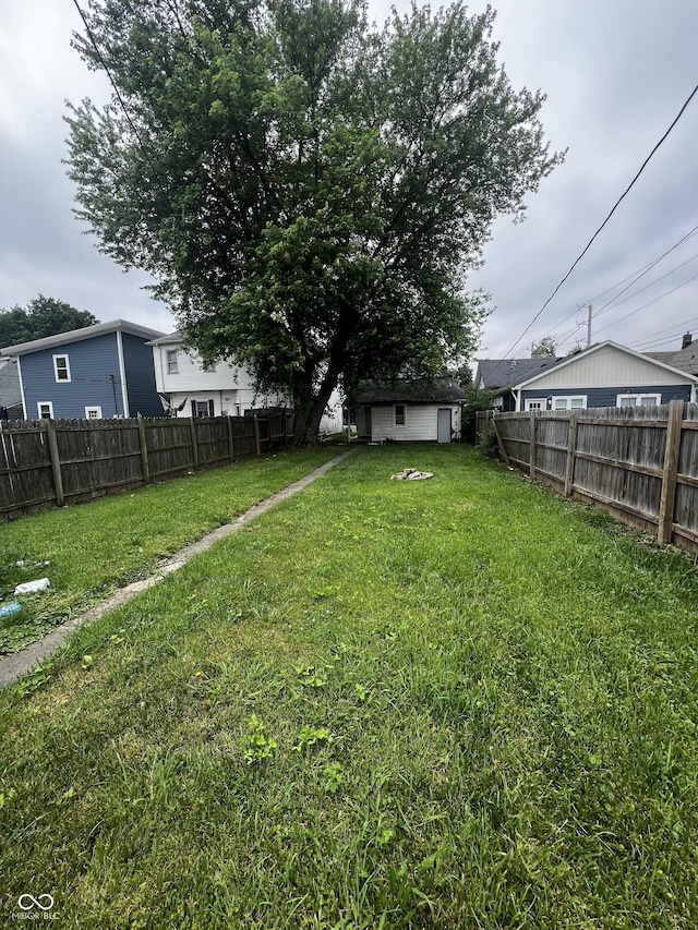 1125 Laurel St, Indianapolis, IN 46203 - view of yard with an outbuilding