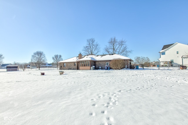 view of yard covered in snow