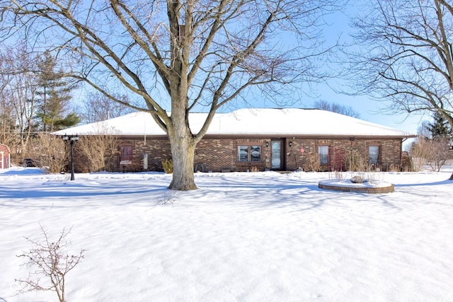 view of snow covered property