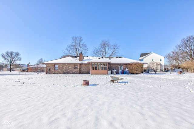 view of snow covered property