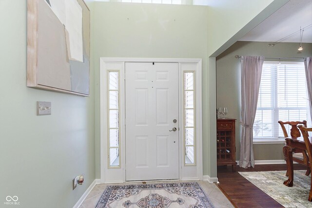 view of tiled foyer entrance