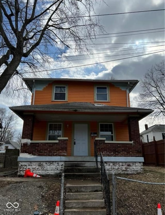 view of front of home featuring covered porch