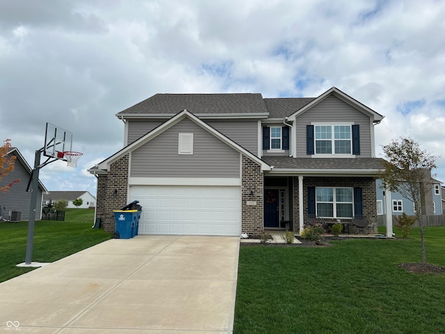 view of front facade featuring a garage, central AC unit, and a front lawn