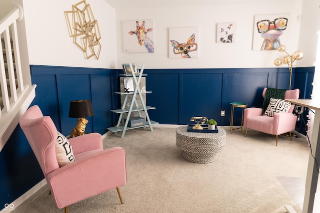 sitting room featuring carpet floors