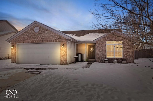 ranch-style home featuring a garage