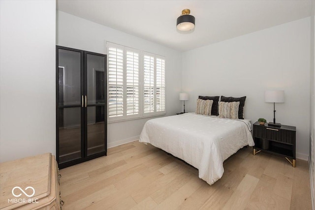 bedroom featuring light hardwood / wood-style floors