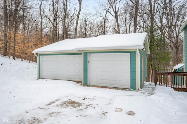 view of snow covered garage