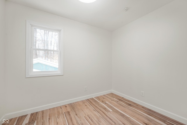 unfurnished room featuring light hardwood / wood-style flooring