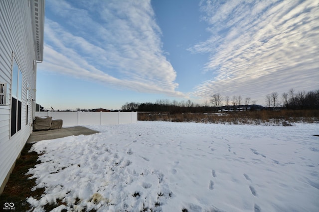 view of yard covered in snow