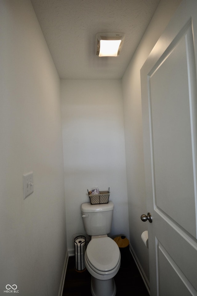 bathroom featuring toilet