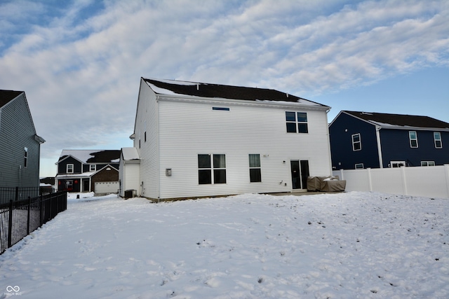 view of snow covered property