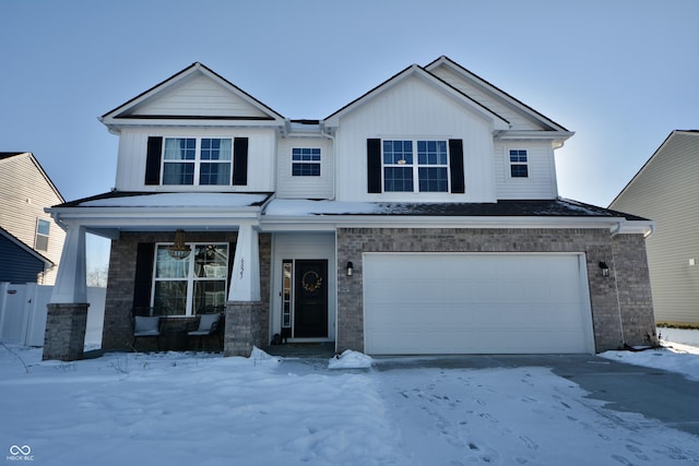 view of front facade featuring a garage and a porch