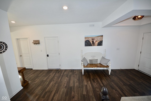 foyer with dark hardwood / wood-style floors