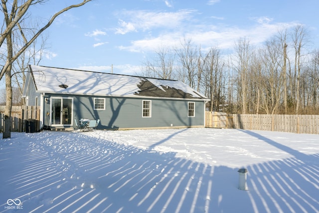 view of snow covered house