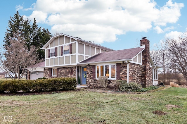 tudor home with a garage and a front yard