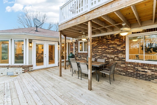 wooden deck with french doors and ceiling fan