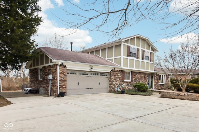 view of side of property with a garage