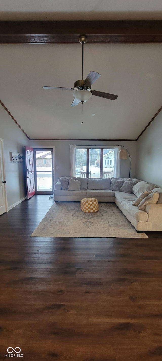 unfurnished living room with ceiling fan, dark hardwood / wood-style flooring, and crown molding