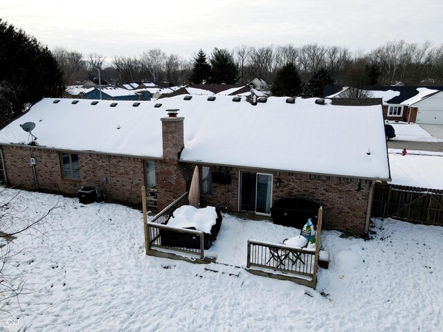 view of snow covered property