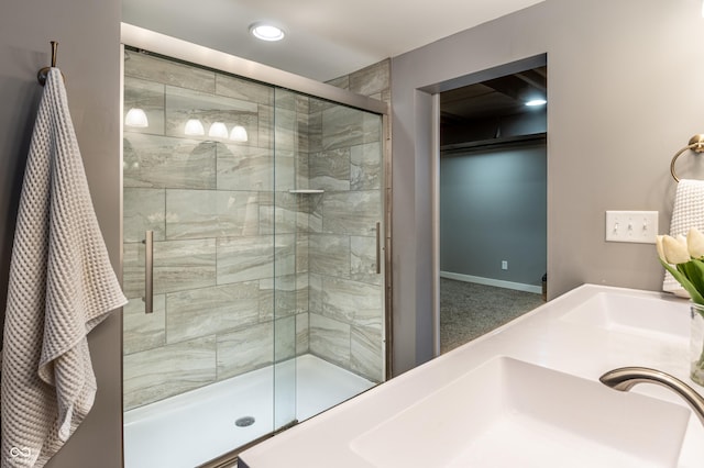 bathroom featuring sink and walk in shower