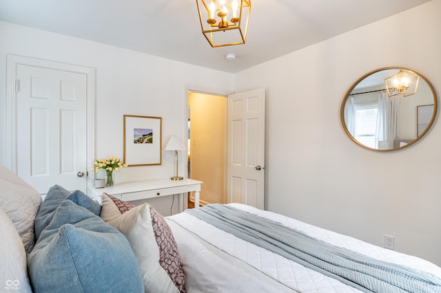 bedroom with a chandelier