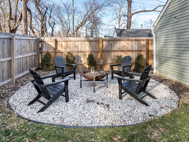 view of patio featuring an outdoor fire pit