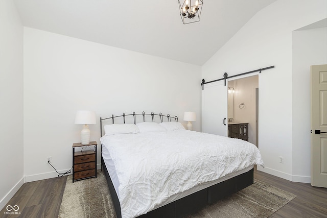 bedroom featuring a barn door, baseboards, dark wood-type flooring, and high vaulted ceiling